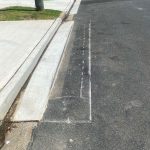 Before Image of Asphalt Patch Repairs & Layback Gutter Edge Repairs in Padstow Heights, NSW